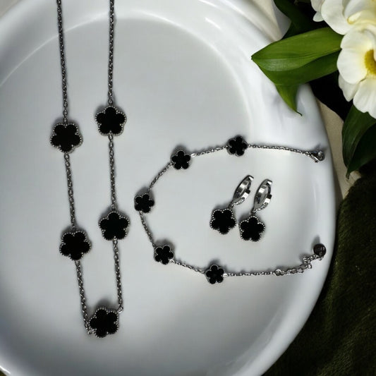 Set collana bracciale orecchini fiore nero